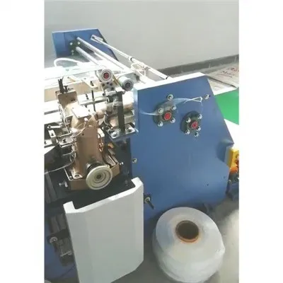 Mesin Pemotong dan Jahit Jahitan Ganda